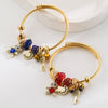 Wholesale Women's Alloy And Titanium Steel Bracelet With Bear Key Crystal Pendant