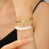 Wholesale Women's Alloy Beaded Bracelet With Irregular Imitation Pearl Stitching And Bow Tie Pendant Electroplating Design