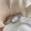 Wholesale Women's Alloy Case Quartz Watch With Rhinestone Oval Dial And Refined Steel Belt Business Style