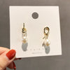 Wholesale Women's Alloy Earrings Cold Style Asymmetric Pearl Natural Geometric Electroplated