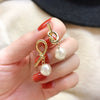 Wholesale Women's Alloy Earrings Cold Style Asymmetric Pearl Natural Geometric Electroplated