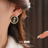 Wholesale Women's Alloy Earrings With Black Round Shape And Letter Pattern Electroplated Highend Style