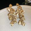Wholesale Women's Alloy Electroplated Flower Pattern Light Luxury High Sense French Tassel Earrings