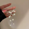 Wholesale Women's Alloy Electroplated Flower Pattern Light Luxury High Sense French Tassel Earrings