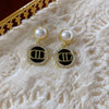 Wholesale Women's Alloy Flower Earrings With Diamond And Pearl Design Retro Fashion Temperament
