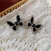 Wholesale Women's Alloy Flower Earrings With Diamond And Pearl Design Retro Fashion Temperament