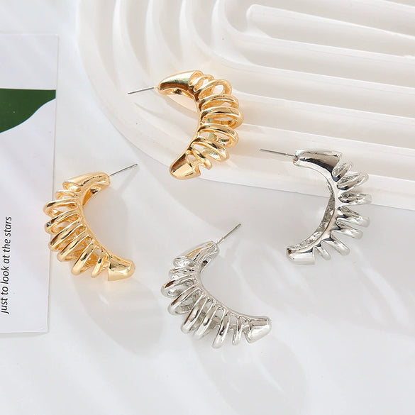 Wholesale Women's Alloy Geometric Exaggerated Hollow Cshaped Electroplated Retro Spring Earrings