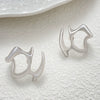 Wholesale Women's Alloy Geometric Irregular Liquid Hollow Electroplated Earrings