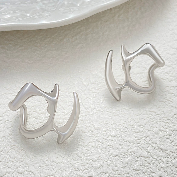 Wholesale Women's Alloy Geometric Irregular Liquid Hollow Electroplated Earrings