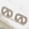 Wholesale Women's Alloy Geometric Letter V Inlaid Rhinestone Stud Earrings