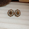 Wholesale Women's Alloy Geometric Maillard Style Earrings With Silver Needle And Electroplating