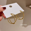 Wholesale Women's Alloy Geometric Round Cross Earrings With Electroplating Retro Temperament And Light Luxury Design