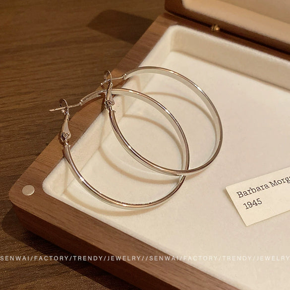 Wholesale Women's Alloy Geometric Round Plain Hoop Earrings With Electroplating