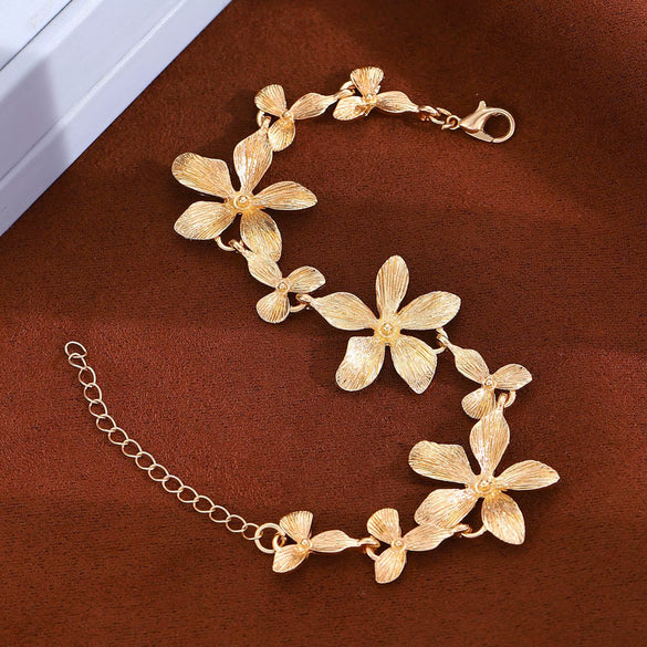 Wholesale Women's Alloy Goldplated Flower Stitching Bracelet Jewelry