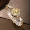 Wholesale Women's Alloy Leisure Watch With Colorful Gemstones And Round Dial And Gold Horseshoe Buckle