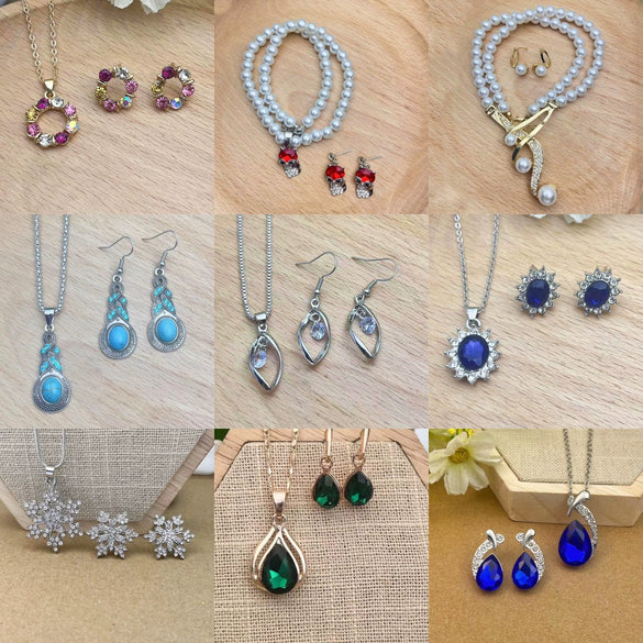 Wholesale Women's Alloy Water Drops Pattern Electroplated Pearl Chain Clavicle Chain And Earrings Three Piece Set