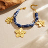 Wholesale Women's Ancient Style Plants And Flowers Pattern Blue Printed Fabric Chain Goldplated Stainless Steel Flower Pendant Jewelry Set