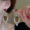 Wholesale Women's Artificial Crystal Butterfly Earrings With Real Gold Electroplated Silver Needles And Inlaid Pearls