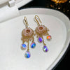 Wholesale Women's Artificial Crystal Butterfly Earrings With Real Gold Electroplated Silver Needles And Inlaid Pearls