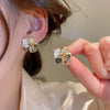 Wholesale Women's Artificial Crystal Butterfly Earrings With Real Gold Electroplated Silver Needles And Inlaid Pearls