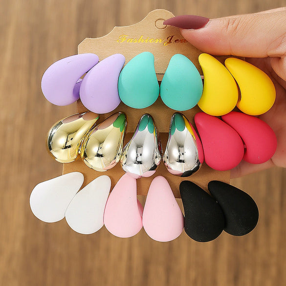 Wholesale Women's Casual Geometric Cshaped Spraypainted Plastic And Resin Earrings With Electroplating