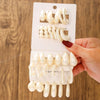 Wholesale Women's Casual Geometric Cshaped Spraypainted Plastic And Resin Earrings With Electroplating