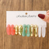 Wholesale Women's Casual Geometric Cshaped Spraypainted Plastic And Resin Earrings With Electroplating