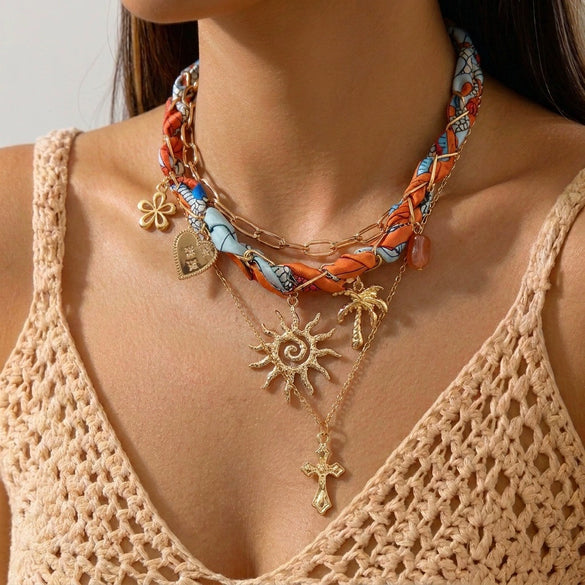 Wholesale Women's Casual Minimalist Geometric Alloy Electroplated Necklace With Ocean Style Sun Pendant And Regular Chain