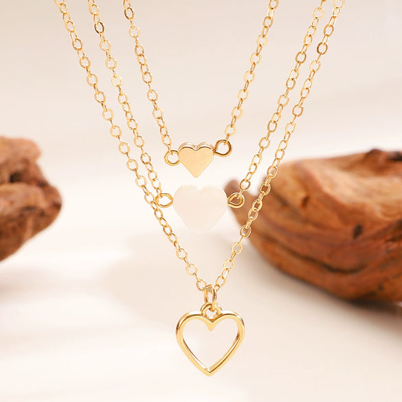Wholesale Women's Casual Multilayered Necklace Threepiece Set With Electroplated Zinc Alloy Heart Pendant