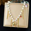 Wholesale Women's Casual Stainless Steel Electroplated Heart Shape Insect Pattern Pearl Strand Beaded Chain Necklace With Imitation Pearl Tassel Pendant