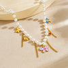 Wholesale Women's Casual Stainless Steel Electroplated Heart Shape Insect Pattern Pearl Strand Beaded Chain Necklace With Imitation Pearl Tassel Pendant