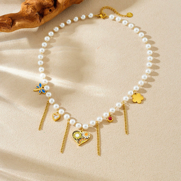 Wholesale Women's Casual Stainless Steel Electroplated Heart Shape Insect Pattern Pearl Strand Beaded Chain Necklace With Imitation Pearl Tassel Pendant