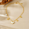 Wholesale Women's Chic Style Gold Electroplated Hollow Heart Shape Pearl Pendant Stainless Steel Necklace With Flat Cross Chain