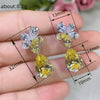 Wholesale Women's Copper Dropshaped Flower Earrings In Fashion Ol Style