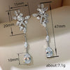 Wholesale Women's Copper Dropshaped Flower Inlaid Zircon Earrings