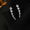 Wholesale Women's Copper Earrings With U Shaped Zircon Design And Four Claw Setting