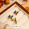 Wholesale Women's Copper Enamel Flower Dripping Oil Earrings Light Luxury Style