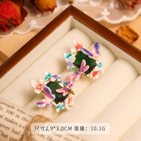 Wholesale Women's Copper Enamel Flower Dripping Oil Earrings Light Luxury Style
