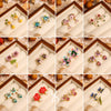 Wholesale Women's Copper Enamel Flower Dripping Oil Earrings Light Luxury Style
