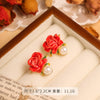 Wholesale Women's Copper Enamel Flower Dripping Oil Earrings Light Luxury Style