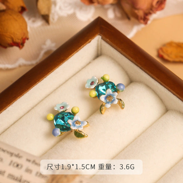 Wholesale Women's Copper Enamel Flower Dripping Oil Earrings Light Luxury Style