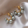 Wholesale Women's Copper Geometric Pearl Earrings With Diamond Design Retro And Exquisite Style