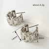 Wholesale Women's Copper Geometric Zircon Earrings With Metallic Strap And Niche Design