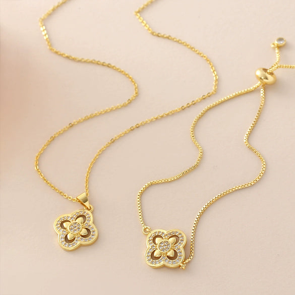 Wholesale Women's Copper 18K Gold Plated Fourleaf Clover Pendant Necklace And Bracelet Set With Ochain