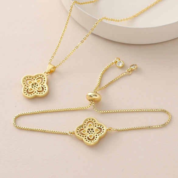 Wholesale Women's Copper 18K Gold Plated Fourleaf Clover Pendant Necklace And Bracelet Set With Ochain