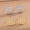Wholesale Women's Copper Letter Earrings With 18K Gold Plating And Zircon Light Luxury And Simple Style