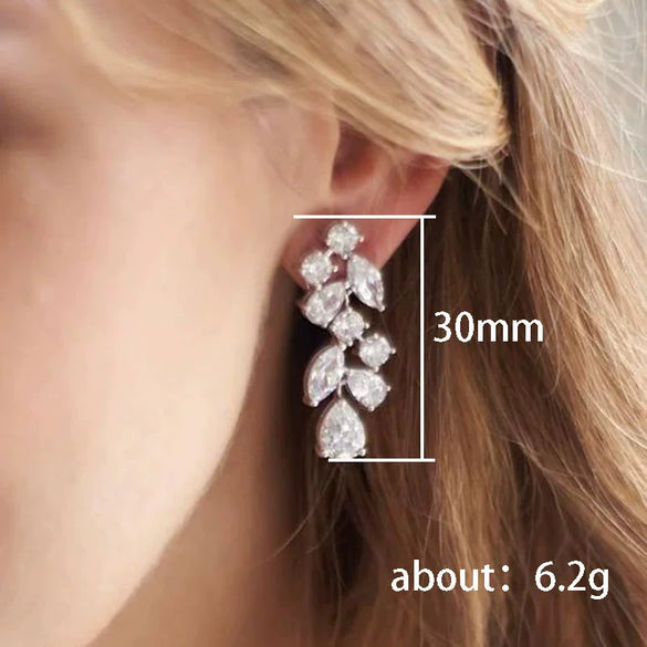 Wholesale Women's Copper Long Tassel Petal Earrings With Flower And Leaf Pattern
