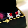 Wholesale Women's Copper Loveshaped Water Drop Flower Earrings With Electroplating Treatment And Floral Design