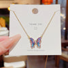 Wholesale Women's Copper Mixed Gemstone Setting Zircon Heart Shape Tassel Cross Chain Necklace