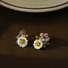 Wholesale Women's Copper Simple Geometric Daisy Flower Earrings With Electroplating